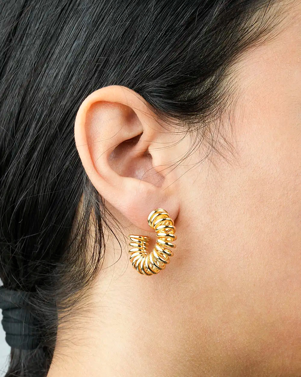 Model Image Statement Wide Spring Tied Hoop Earrings EG2400079