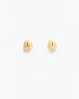 Gold earrings on a white background