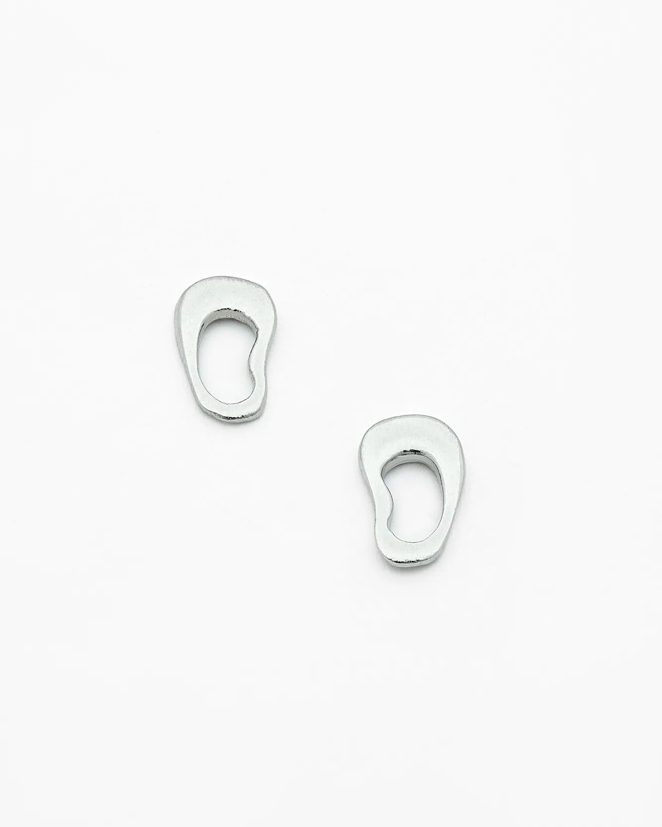 Pair of silver earrings on a white background