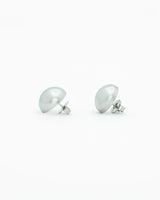 Pair of silver earrings on a white background