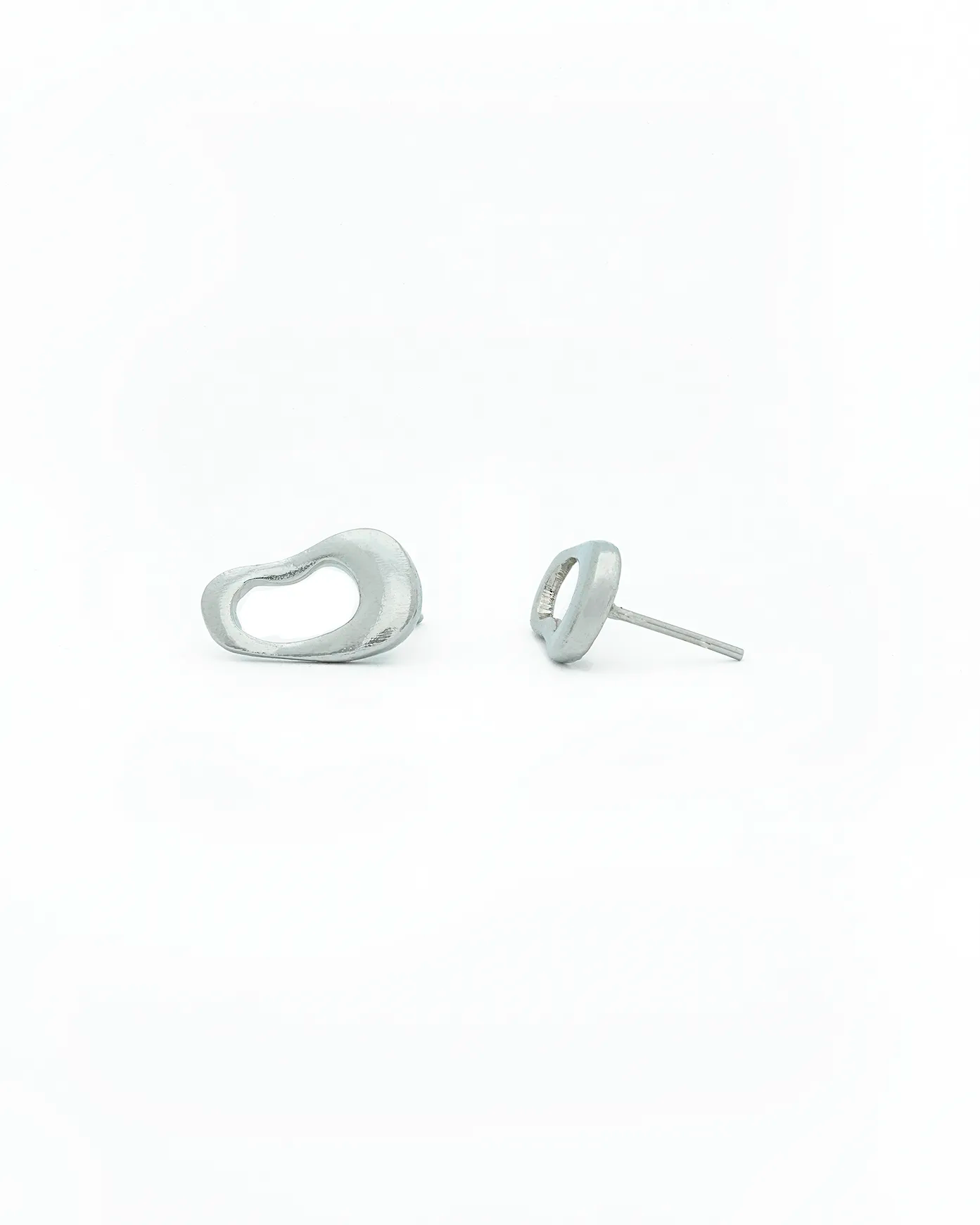 Silver heart-shaped earrings on a white background