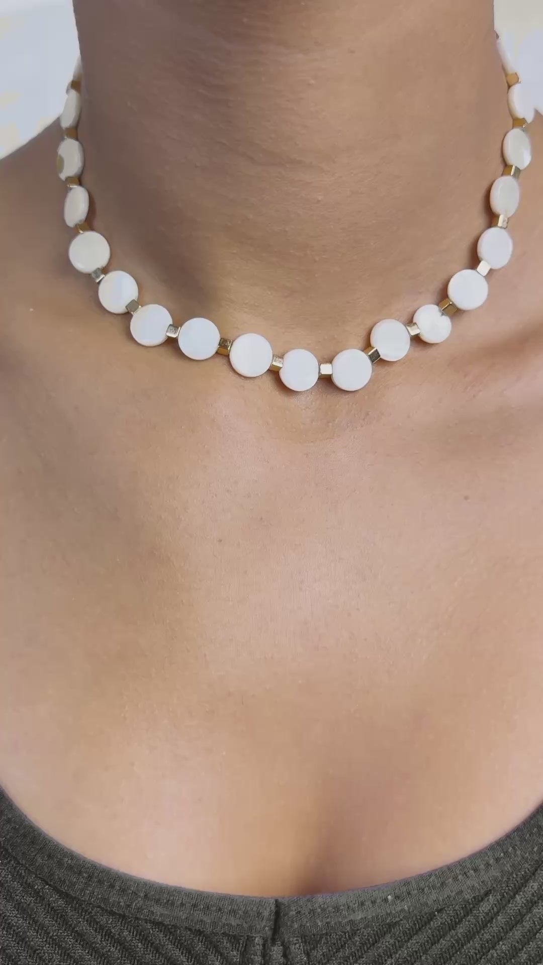 Woman wearing a pearl chocker