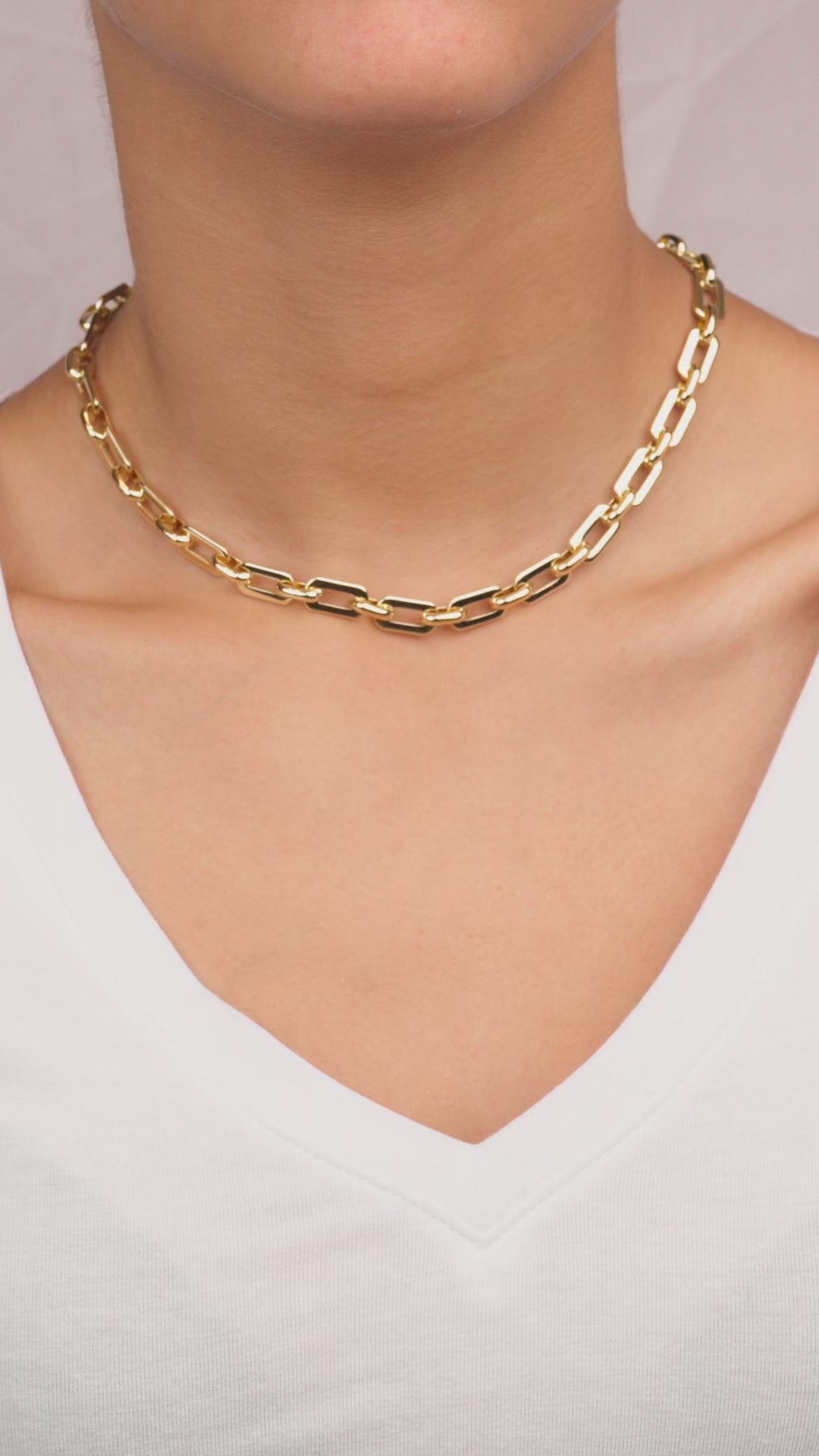 Video of Model wearing Paperclip Cable Link Chain Necklace in 18K Gold