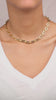 Video of Model wearing Paperclip Cable Link Chain Necklace in 18K Gold